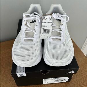 Brand new women’s Adidas Duramo SL size 10 white sneakers.From non smoking home.